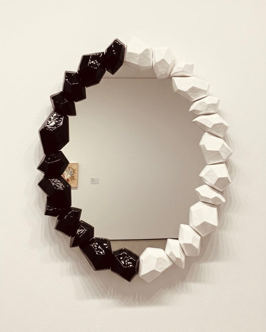 The Rhythmic Oval Mirror