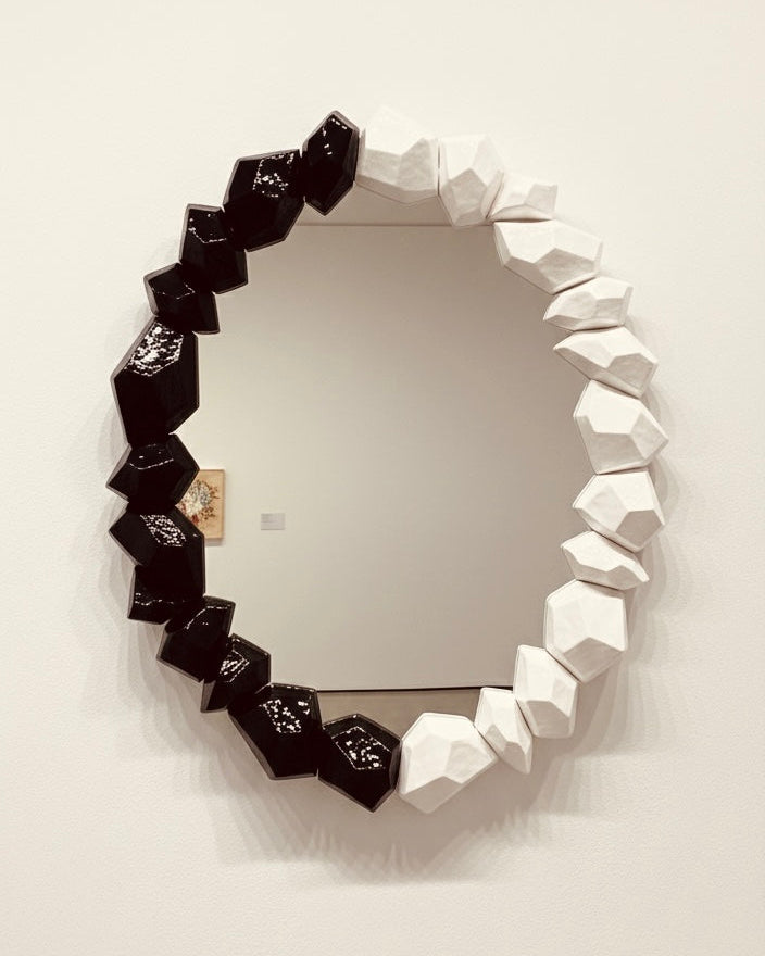 The Rhythmic Oval Mirror